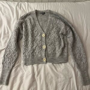 An extra smalll gray cropped button up cardigan brand cupcake at Francesca’s